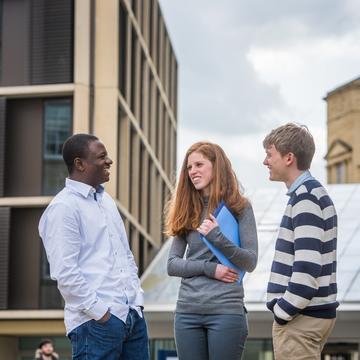 Three Oxford University students chatting